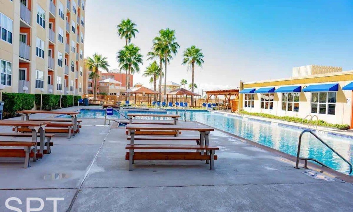 South Padre Island Condo | Beach access Condo Nice pool/hot tub area w/bbq 2 Bedroom Home by RedAwning