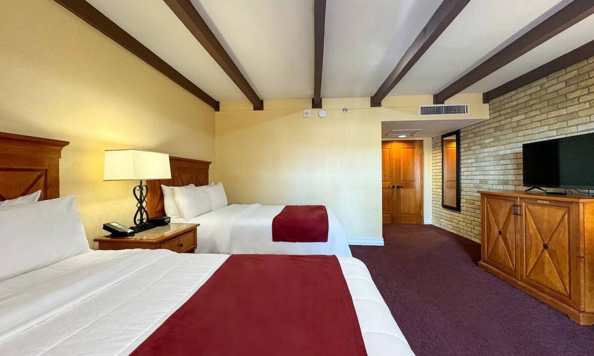 Western Division Hotel | Central Laredo Stay w/Two Pools, Hot Tub, Grill, Airport Shuttle & EV Charging!