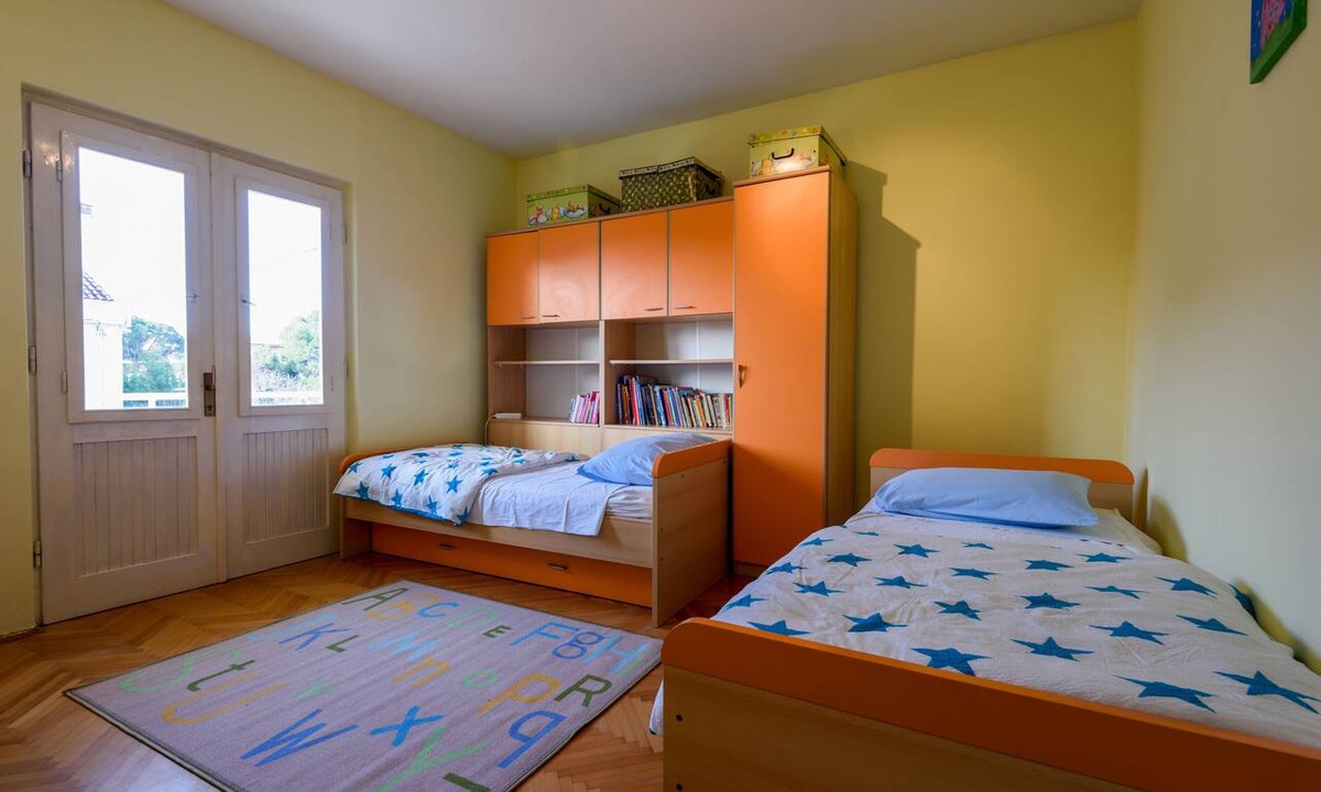 Zadar Apartment | The apartments consists of two bedrooms, a bathroom, a kitchen and a living room