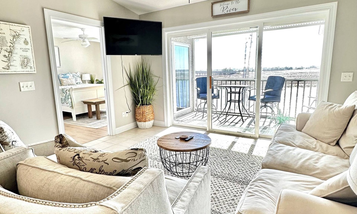 Darien Condo | Wake Up on the River! Walk to charming Downtown Darien. w/boat slip
