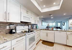 Fully Renovated Getaway with Beachfront Patio - Steps to Pool & Hot Tub