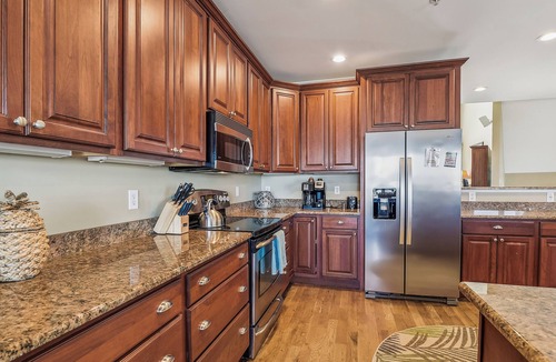Fenwick Island House | Activities included up to $300 FREE PER WEEK! NEW LISTING 2024! Exceptional and spacious multi-level 4 bedroom plus den, 4 full bath townhome overlooking the bay offering panoramic views and glorious sunsets from any of the 3 open decks!