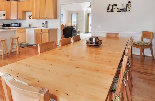 Bethany Beach House | Activities included up to $300 FREE PER WEEK! FREE DAILY ACTIVITIES! Waterfront location with bright and beachy decor this vacation townhome boasts incredible views from every level! Located in North Bethany close to the Indian River Inlet and ma