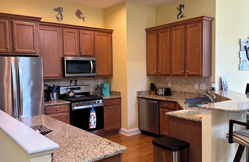 The Commons Villa | Bayside luxury home! Pools, jacuzzi playground Bay view restaurant, golf course!