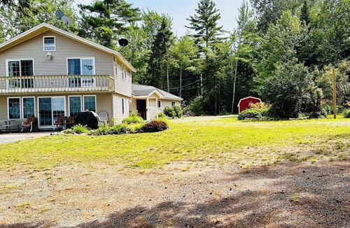 North Penobscot House | Beautiful and private lakefront home on the sandy shores of South Twin Lake