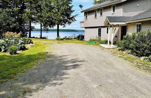 North Penobscot House | Beautiful and private lakefront home on the sandy shores of South Twin Lake
