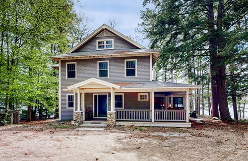 Meredith House | Captivating waterfront home with private dock & beach, lake views