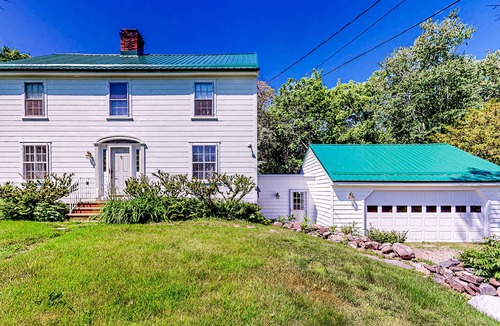 Orono House | Classic waterfront retreat with a grill, firepit, four bedrooms, W/D, and AC