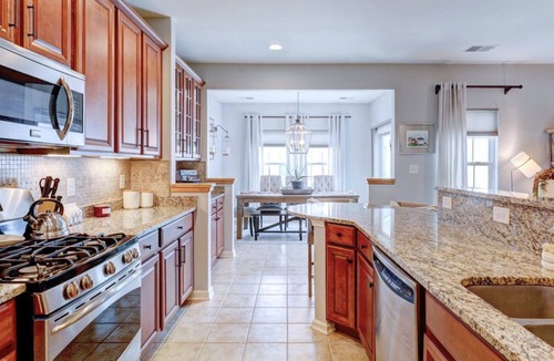 Lewes House | Convenient Lewes location with fenced yard, game room and huge community pool!