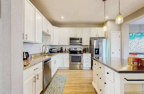 Ocean View House | Creekside townhouse with patio, grill & community pool - pet friendly