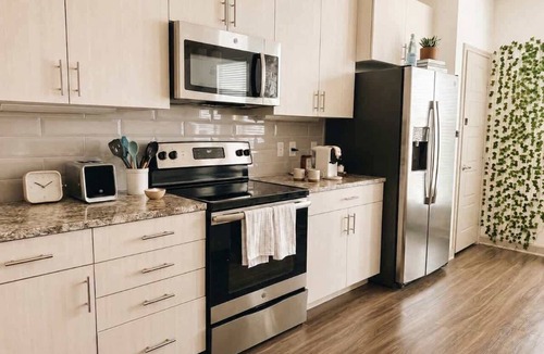 Las Colinas Apartment | Designer Game Suite Resort Amenities DART Rail
