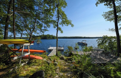 Harrison House | Designer Lakefront Retreat with Panoramic Sunset Views
