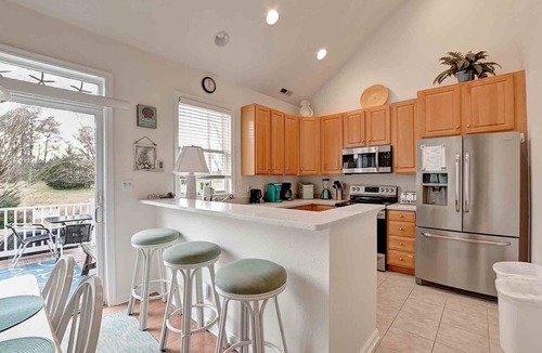 Ocean View House | Dog Friendly, 3 bedroom Townhome in the Bear Trap Dunes Community! WIFI, Community Pool, Beach Shuttle, and more!