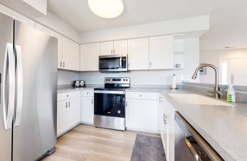 Fenwick Island Condo | East of the Sun condo w/central AC, W/D, & shared pool - under 1 mile to beach