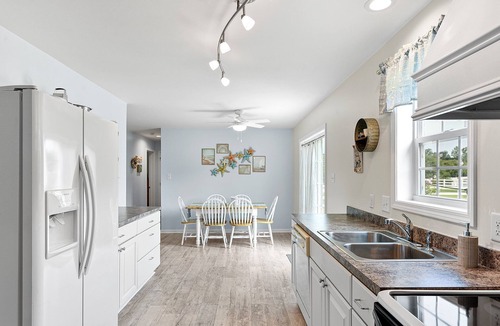 Milton House | Family and Dog Friendly Beach Retreat w/Pool Access, Fenced Yard, and Baby Gear