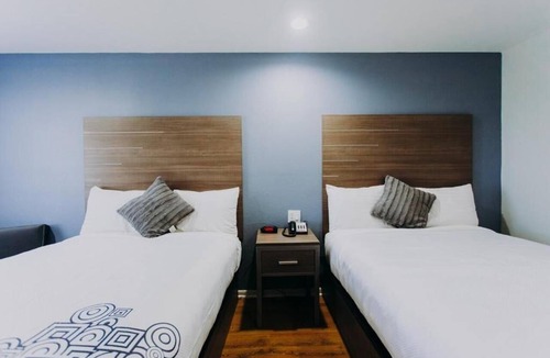 Clear Lake Shores Hotel | Family Stay Right off Route 146 | Relax at Deck with Marina Views
