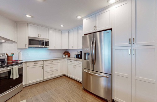 Sun Bay South House | Fully renovated family friendly with covered patio hot tub central location
