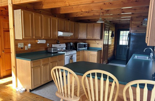 Franklin County Ski Chalet | High View Lodge, log chalet with unparalleled views of Western Maine Mountains