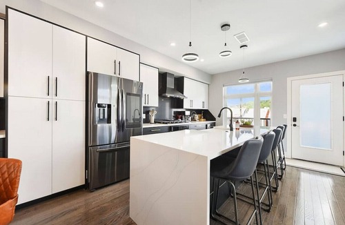 Lawrenceville House | ★ HostWise Stays ★ Rooftop Deck & Fire Pit Haven | Theater & Balcony