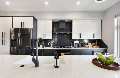 Lawrenceville House | ★ HostWise Stays ★ Rooftop Deck & Fire Pit Haven | Theater & Balcony