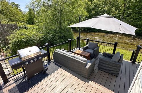 Montgomery Center House | Inviting riverfront home with hot tub on deck & fireplace, near skiing & golf