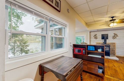 Augusta Cottage | Lakefront Home on Togus Pond with 2 Decks, Great View & Canoe/Fire Pit