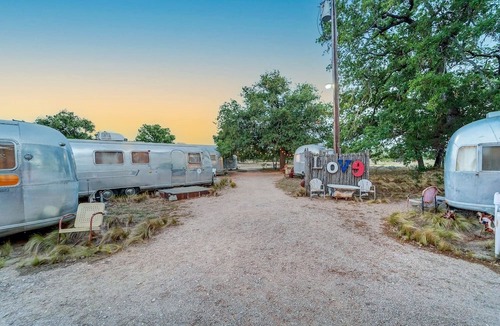 Round Mountain House | Luxury Airstream Campsite Nestled Beneath Oak Trees Outside of Austin, Texas