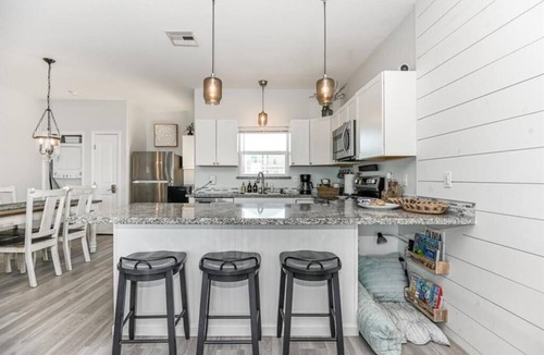 Surfside Beach Condo | Luxury Beachfront Condo with Covered Deck Steps From Beach & Golf Cart Rental