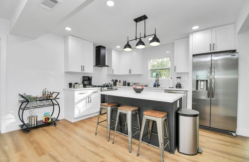 Greater Third Ward House | Media Room & Patio - Downtown View- 4 Bedrooms