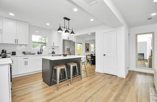 Greater Third Ward House | Media Room & Patio - Downtown View- 4 Bedrooms