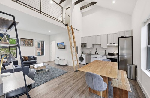 Olde Towne East Apartment | Modern Executive Loft | Work-Ready Mezzanine