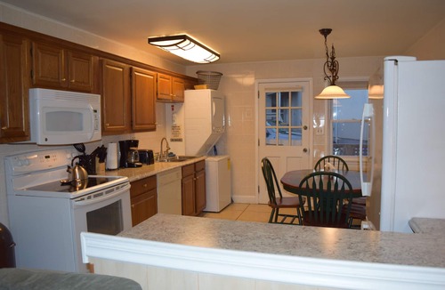 Dewey Beach Apartment | Pet Friendly Ocean Front Building Downtown Dewey Beach Sleeps 7