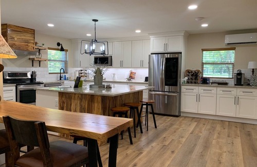 Hunt House | Private Riverfront, HOT TUB, Game room & 4 Patios overlooking the Guadalupe!