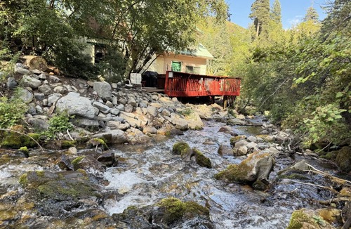 Sundance Cottage | Quiet streamside retreat Hot Tub Deck overlooking the creek Wood-burning stove Tucked below Sundance