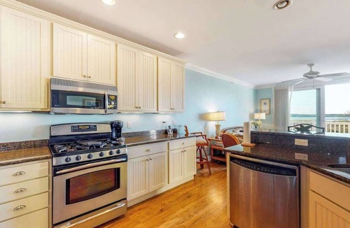 Fenwick Island House | Salt Meadows townhouse w/elevator, gas fireplace & community pool and pier