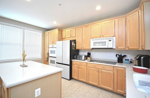 Sunset Island House | Splendid Luxury 5 Bedroom Townhouse with WiFi In Gated Community On Bayside With Indoor/Outdoor Pools, Private Beaches, Restaurant, And More Just Ten Minutes From Beach!