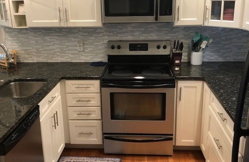 Fenwick Island Condo | The Pink Palace - Fenwick Island Beach Block w/Pool & Super Easy Beach Access