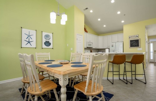 Sunset Island Condo | Top Floor w/water views, Free Linens & Towels! 2 POOLS, Beach Chairs/Beach Cart!