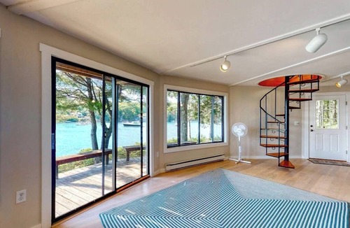 Isle of Springs Cabin | Unique oceanfront home with a deck, tons of natural light, & amazing views