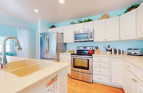 Frankford House | Updated Waterside home near beach with screened deck & community pool