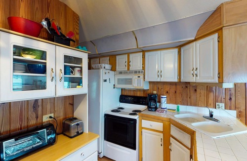 Port Isabel House | Waterfront home w/private dock & shared pools/hot tub/gym - 2 dogs welcome
