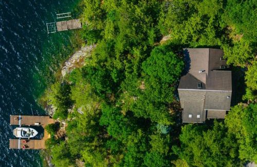 Putnam Station House | Waterfront Lake George Lodge w/Boat Dock & Deck!