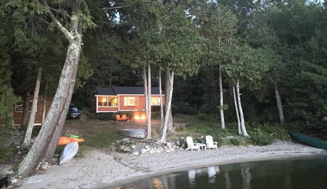 Boating, fishing, and swimming on Green Lake! Your own private beach near Acadia