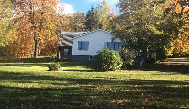Embrace Nature in this Breathtaking Cottage in Portage Lake, Maine