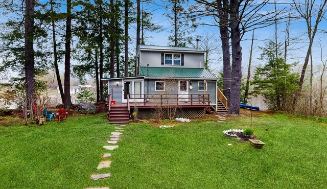 Entire lakefront home on Togus Pond with decks, canoe, firepit & great view