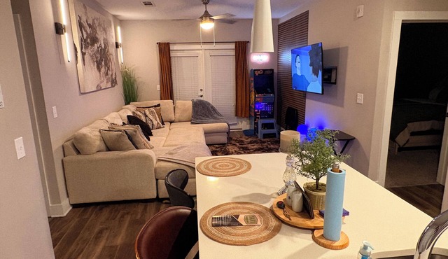 Feel at home in our 2 Bed 2 Bathroom, pool view, game room, palace in Atlanta.
