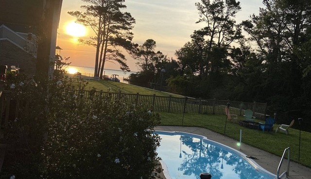 Island home on the water with pool. Bring your boat or jet skis ! Golf near by