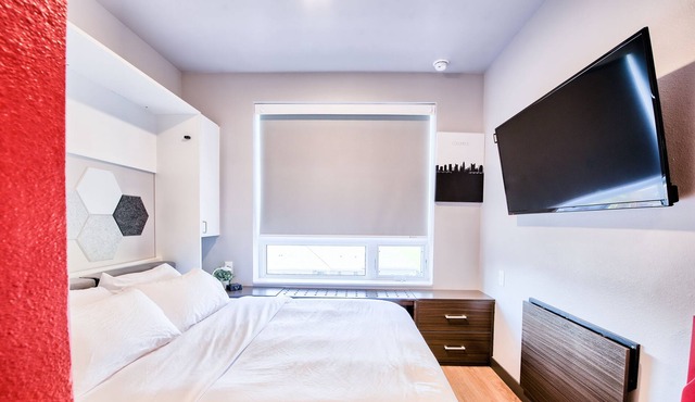 ⭐ Modern Tiny Studio 🌃 Free Parking, Hot Tub, Fitness Center, TV, WiFi, & More!