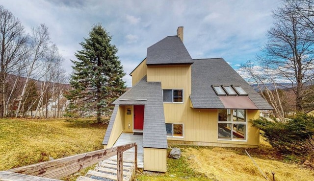 Mountain-view home with new deck, fireplace, & shared pool - walk to lifts