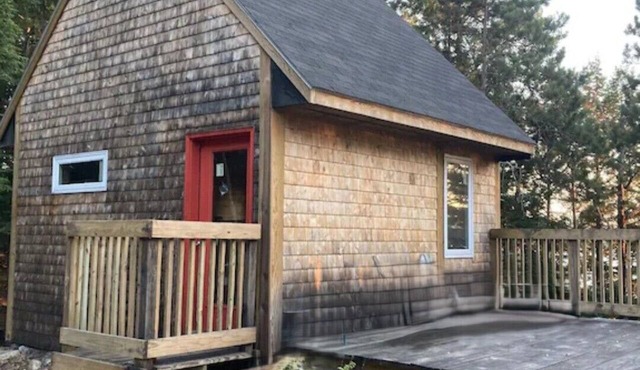 Round Lake Cabin. Escape to lake life close to amenities and attractions.